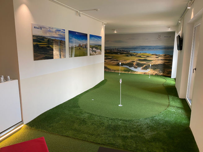 Edmonton indoor putting green in an office with scenic wall art